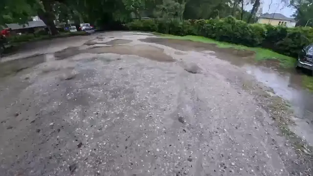 Fixing a potholed gravel lot
