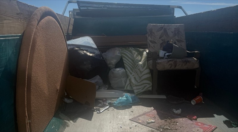 Junk removal load of furniture, rugs and bags in the Southern Hauling dump trailer, Wilmington, NC
