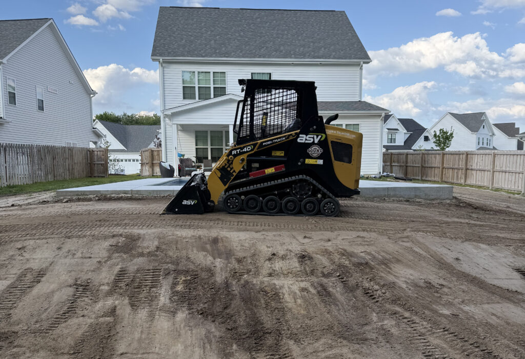 Yard graded level and hydroseeded