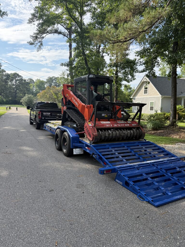 Forestry mulching and brush cutting on an overgrown lot